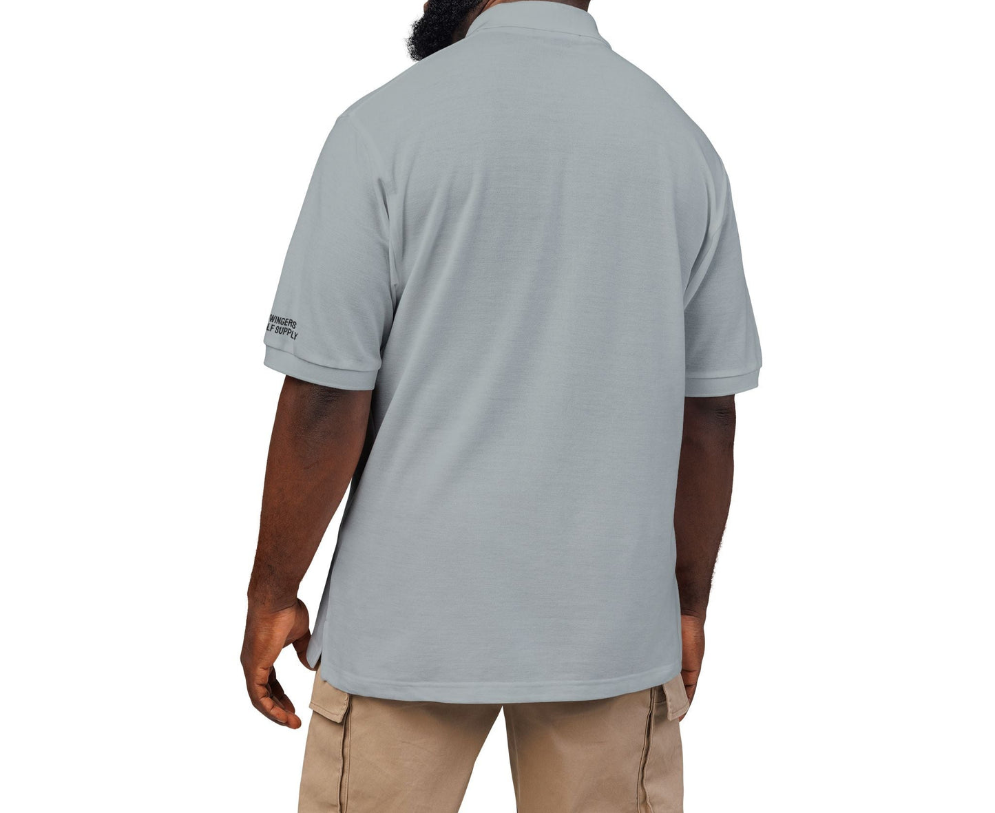 Man wearing a gray polo shirt on a white background