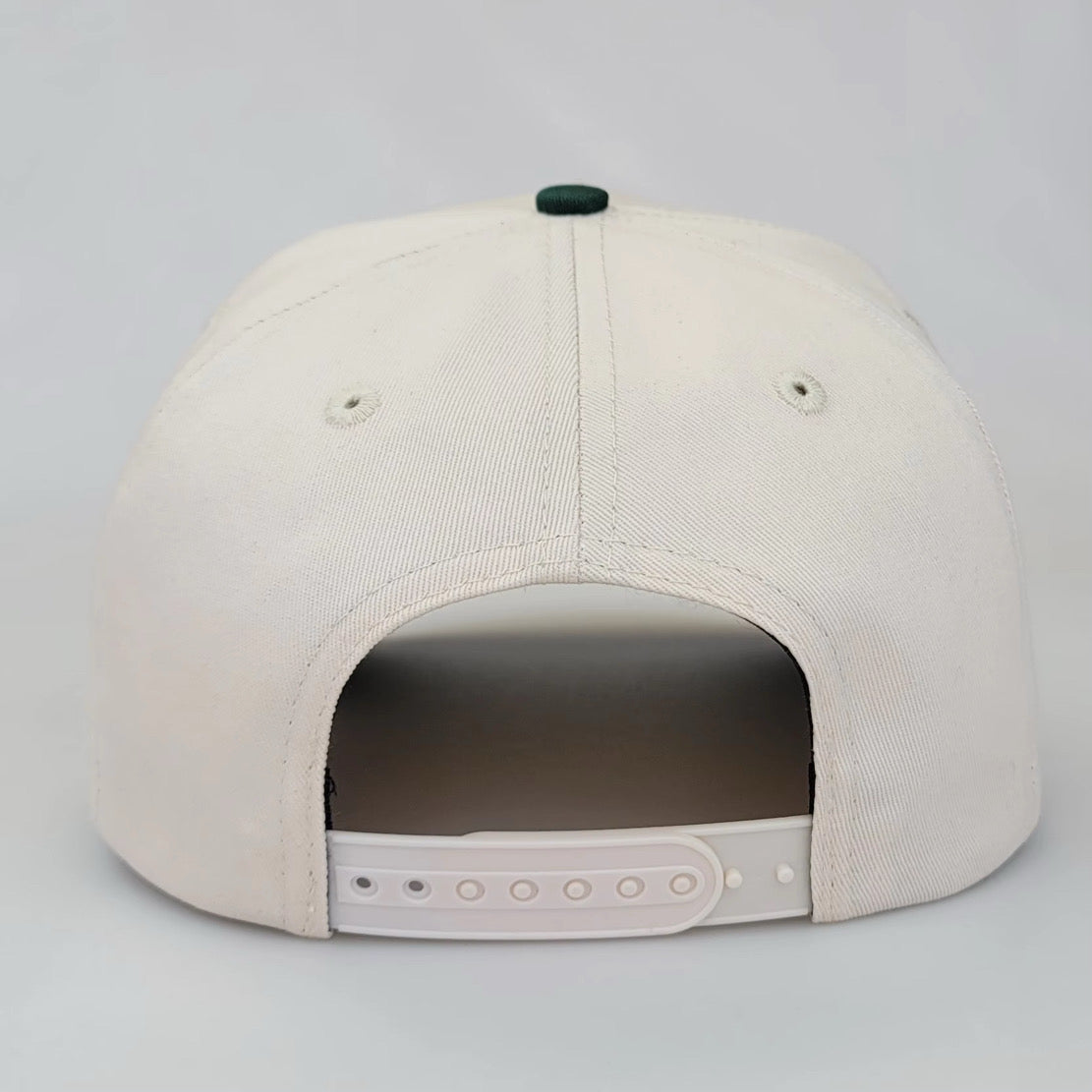Cream and green 5-panel golf snapback hat with SWINGERS Golf Supply logo