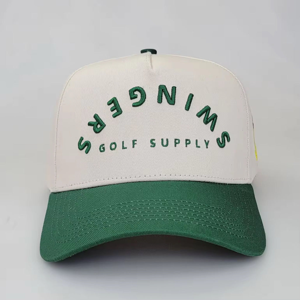 Cream and green 5-panel golf snapback hat with SWINGERS Golf Supply logo