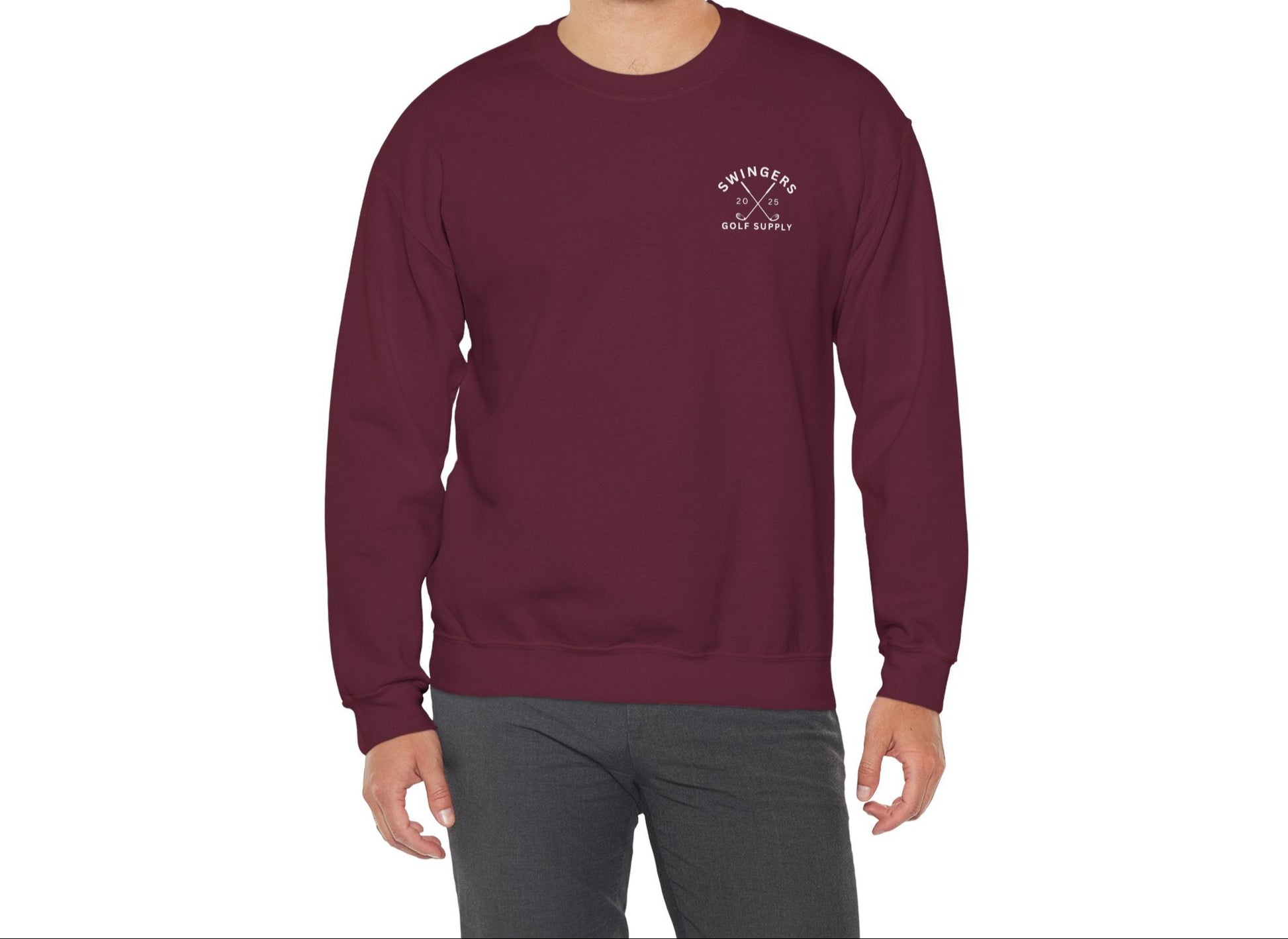 Man wearing a maroon sweatshirt with a logo on a white background