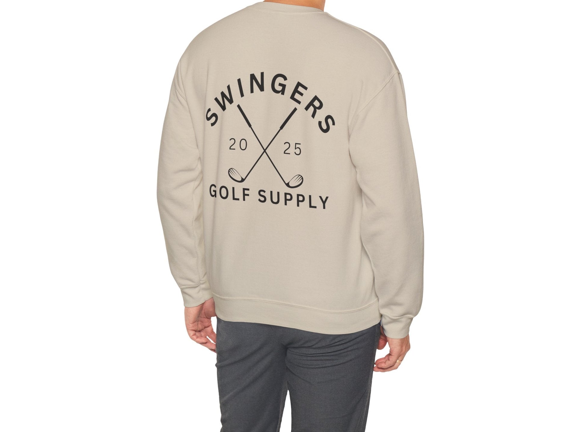 Person wearing a beige sweatshirt with 'Swingers Golf Supply' text and design on the back.