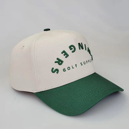 Cream and green 5-panel golf snapback hat with SWINGERS Golf Supply logo